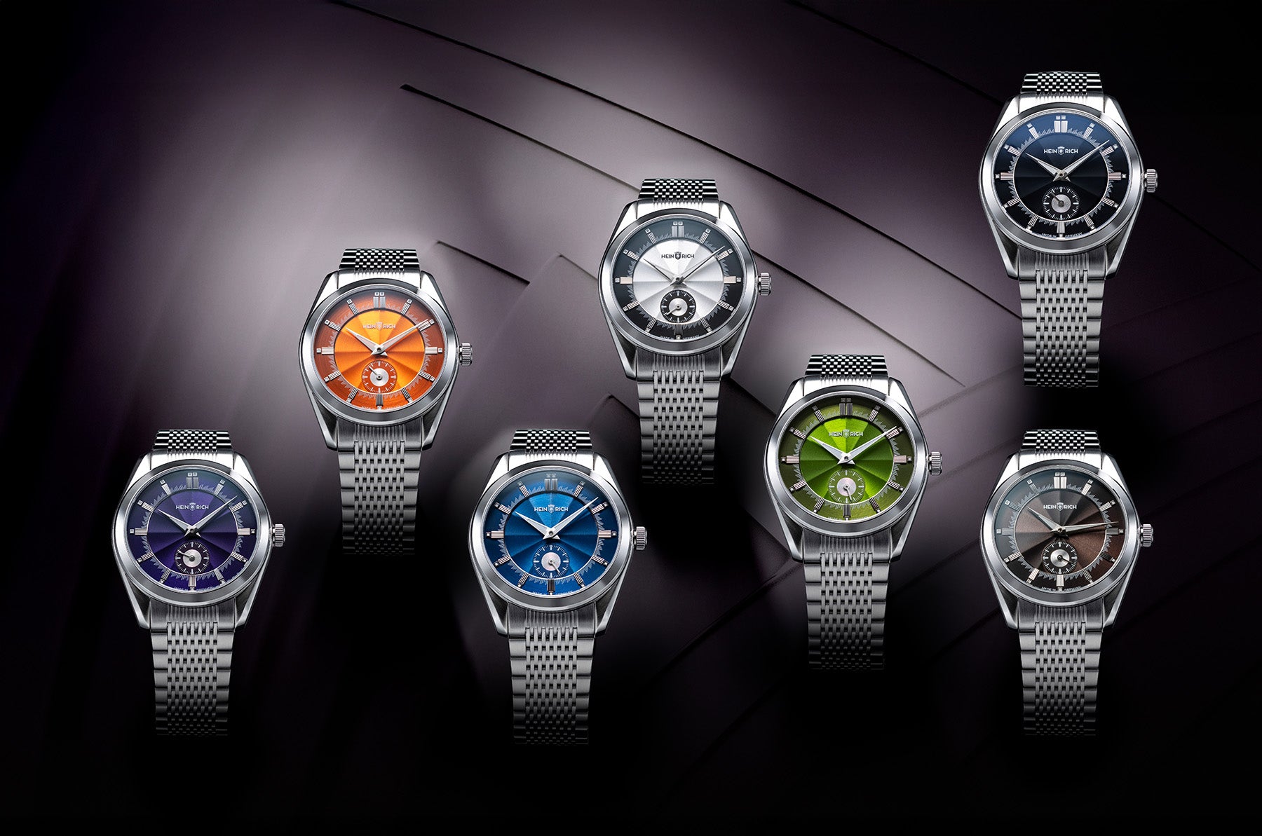HEINRICH Radiance dress watch - 38.5 mm brushed & polished stainless steel case, sector-style sunburst in 7 dial colors. 