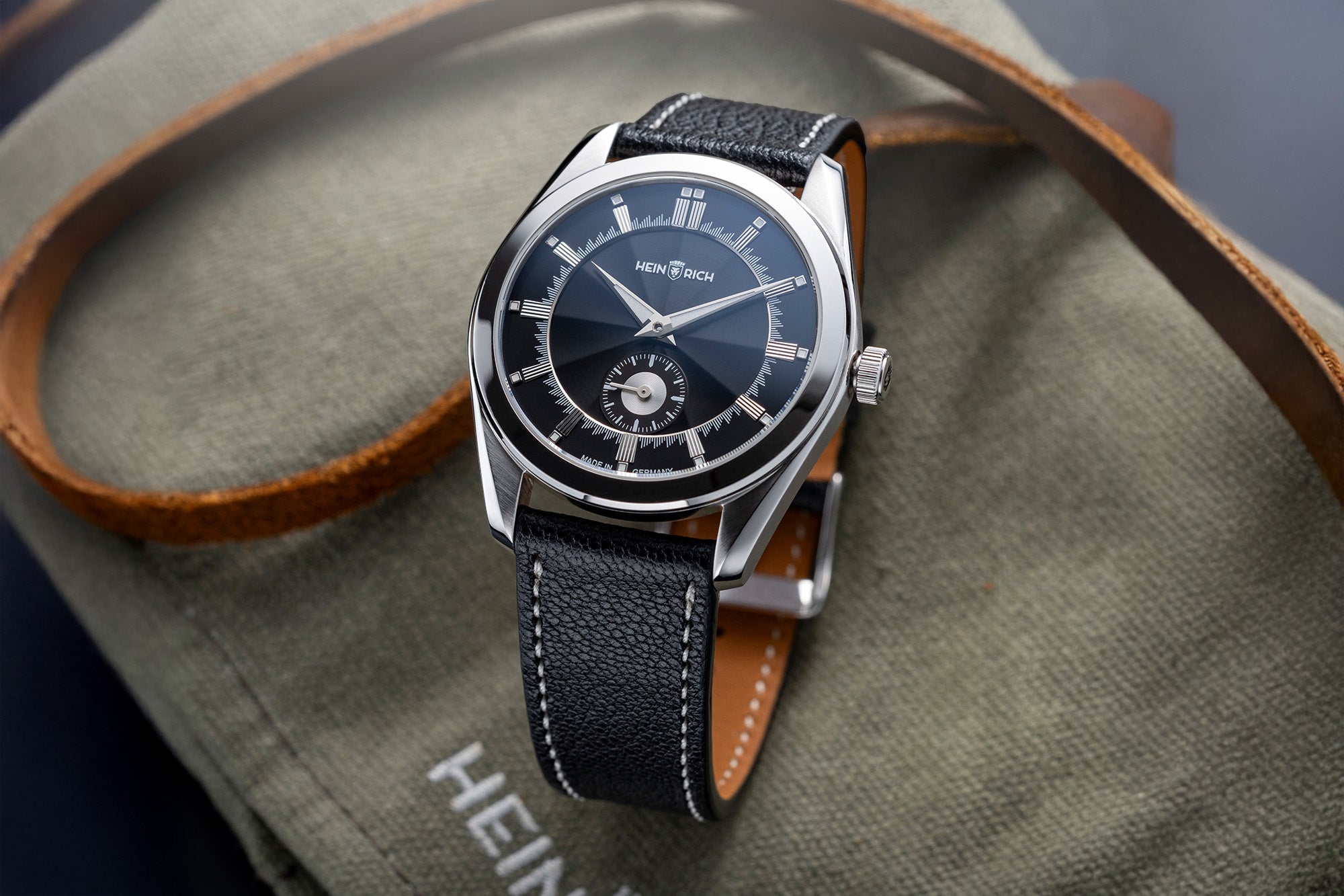 HEINRICH Radiance - thin 8 mm profile manual-wind ETA 7001 movement, black sunburst dial on a black leather strap, made in Germany